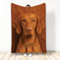 Vizsla dog throw blanket displayed against a wall with warm reddish brown artwork