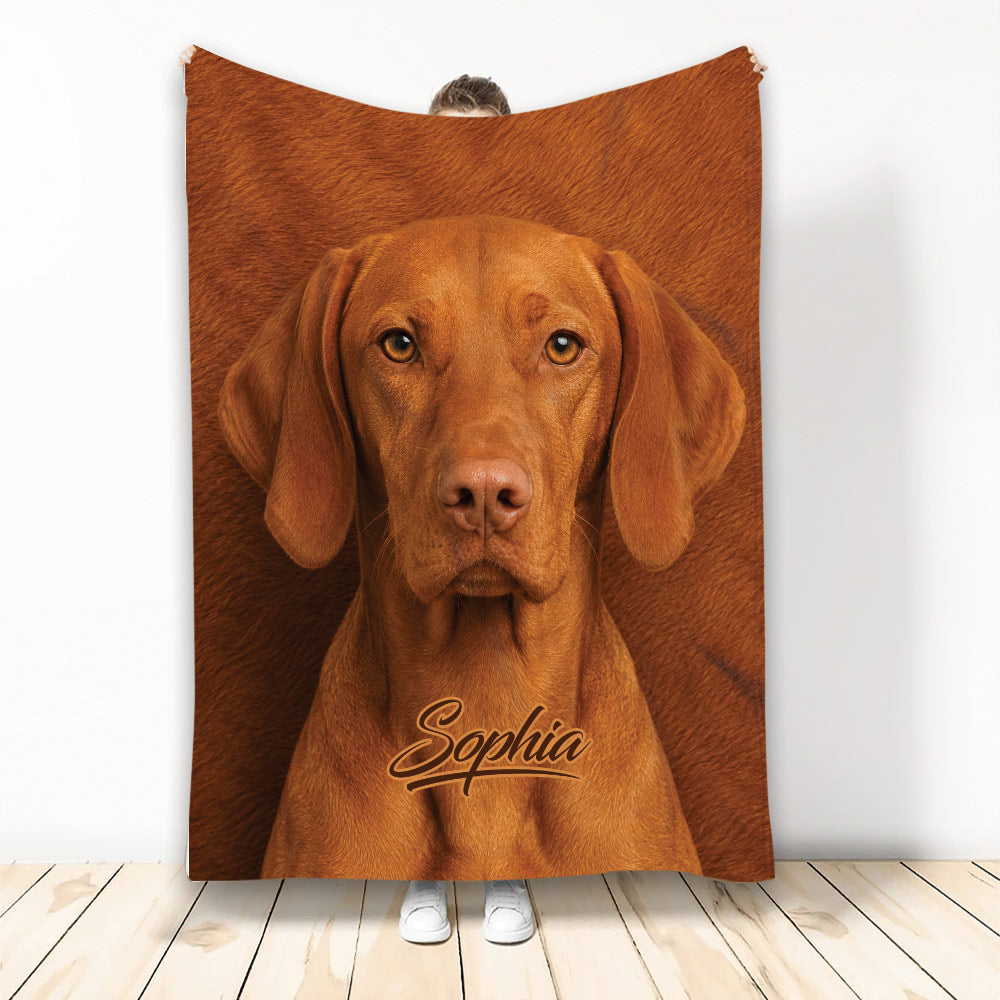 Vizsla dog throw blanket displayed against a wall with warm reddish brown artwork