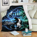 DJ music throw blanket displayed on a sofa with headphones, turntable, speakers, and energetic concert artwork