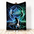 DJ throw blanket featuring headphones, turntable, speakers, concert crowd, and vivid blue and green music artwork