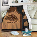 Railroad throw blanket displayed on a sofa with vintage steam train artwork