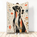 Great Dane blanket with geometric black, cream, and orange dog artwork