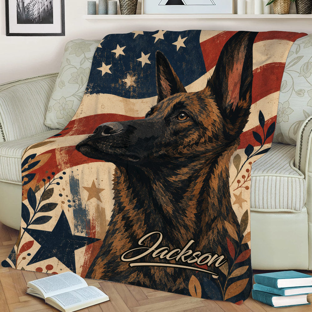 Dutch Shepherd blanket draped over a sofa, featuring rustic American flag colors, stars, and botanical accents