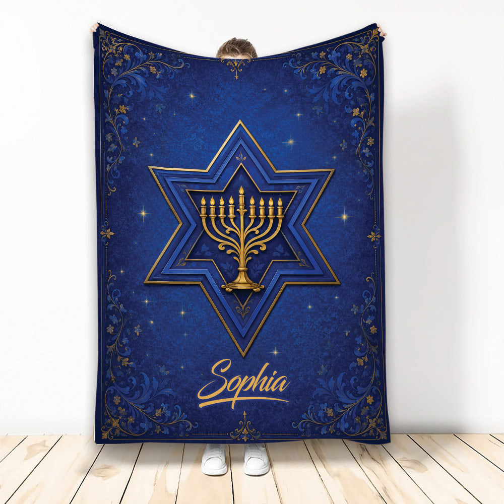 Blue and gold Hanukkah blanket with a menorah inside a Star of David and ornate floral border