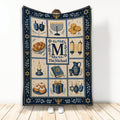 Hanukkah blanket with menorahs, dreidels, Stars of David, candles, gelt, and Jewish holiday artwork