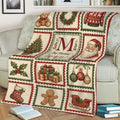 Christmas couch blanket featuring a classic holiday collage of Santa, wreaths, gifts, ornaments, and gingerbread