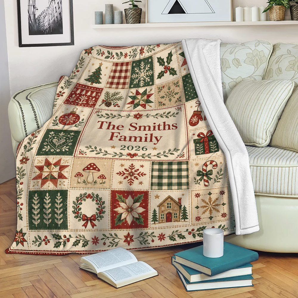 Custom Christmas blanket displayed on a sofa with festive patchwork holiday artwork
