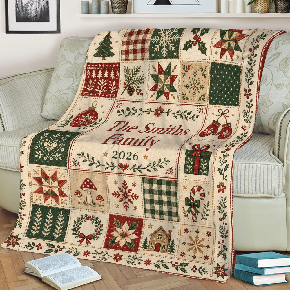 Christmas throw blanket draped over a sofa with rustic holiday patchwork design