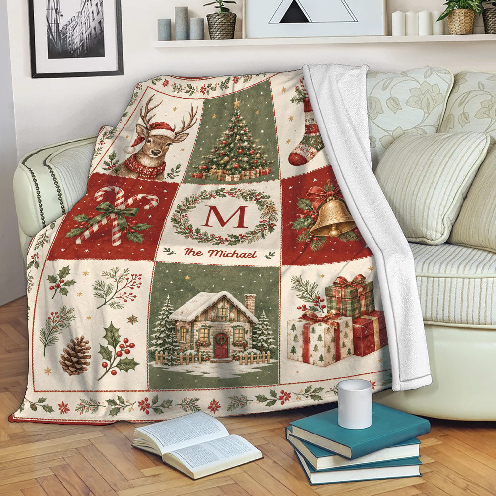 Christmas throw blanket draped over a sofa with rustic holiday panels, greenery, gifts, and a winter cabin