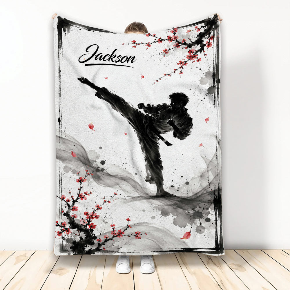 Taekwondo throw blanket with a dynamic martial artist silhouette, red blossoms, and ink wash artwork