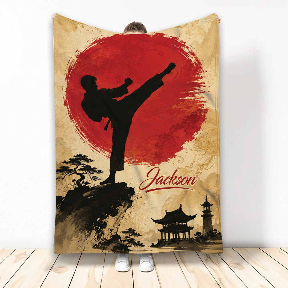 Taekwondo blanket featuring a kicking martial artist silhouette, red sun, Asian landscape, and temple artwork
