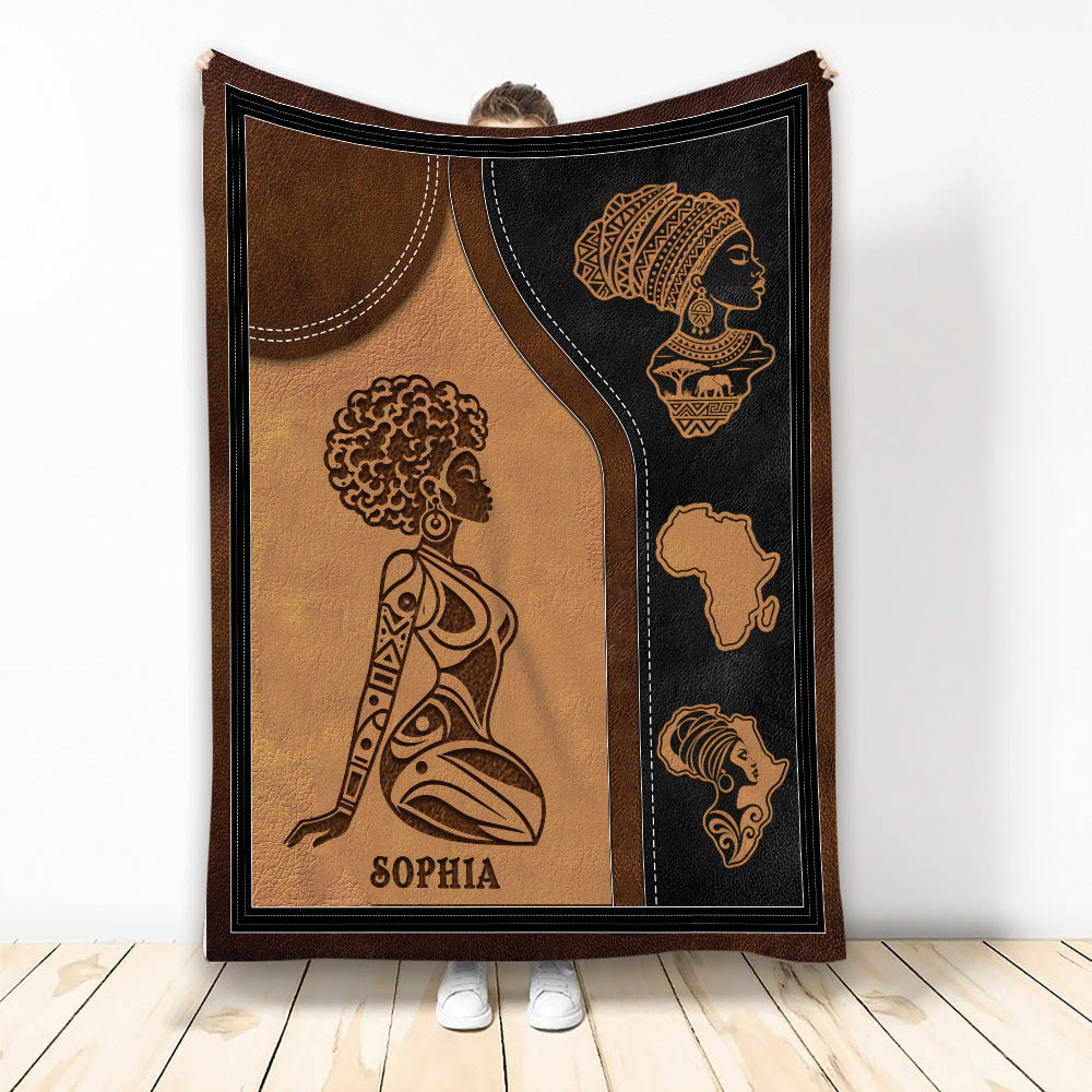 African woman artwork blanket with warm brown tones, geometric heritage motifs, and an Africa map