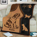 Close view of Saint Bernard dog artwork on a cozy throw blanket in a living room