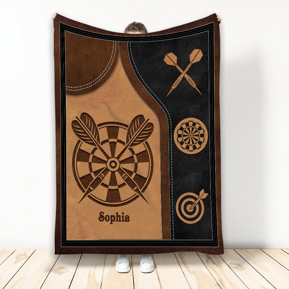 Brown and black dart board throw blanket displayed upright with dartboard and crossed darts artwork