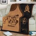 Jiu Jitsu blanket draped over a sofa, featuring grapplers, a martial arts uniform, and belt artwork