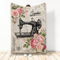 Vintage sewing blanket featuring an ornate black sewing machine, roses, floral accents, and antique-inspired artwork