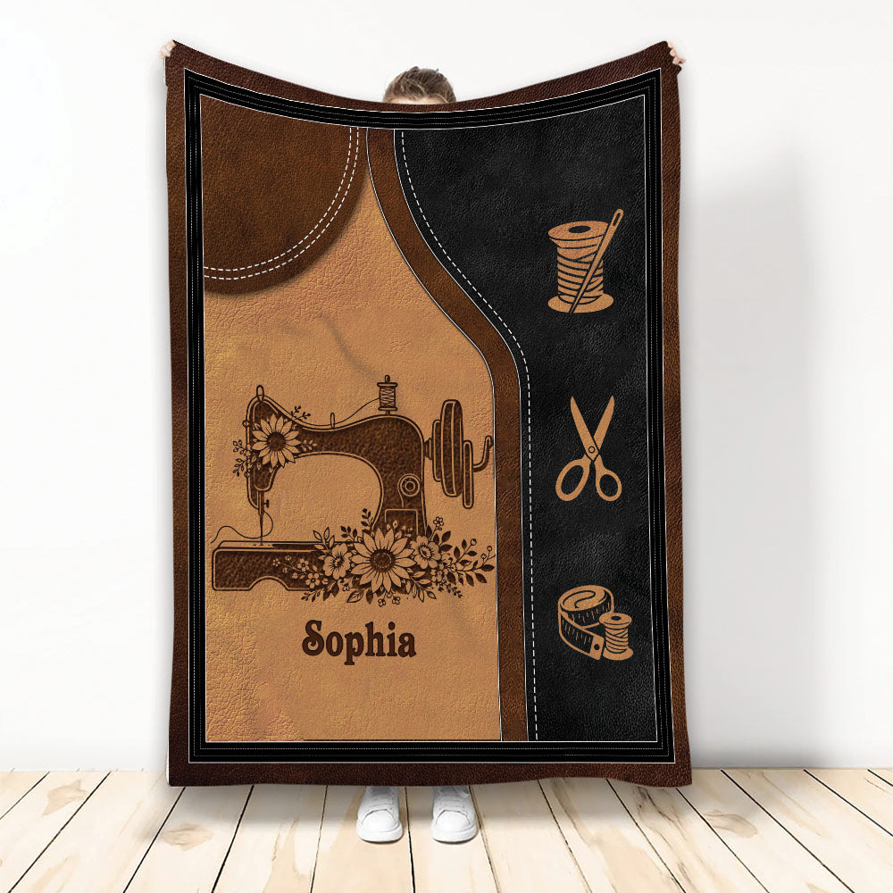 Sewing-themed blanket featuring a floral sewing machine design with scissors, thread, and measuring tape