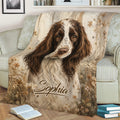 English Springer Spaniel blanket displayed on a sofa, featuring a close-up dog portrait and muted wildflowers