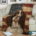 Patriotic English Springer Spaniel blanket styled across an armchair with rustic flag artwork