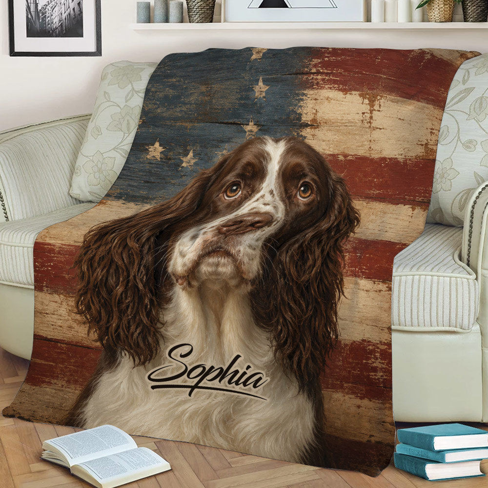 Patriotic English Springer Spaniel blanket styled across an armchair with rustic flag artwork