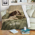 Custom English Springer Spaniel blanket draped over a sofa with a scholarly dog reading a book