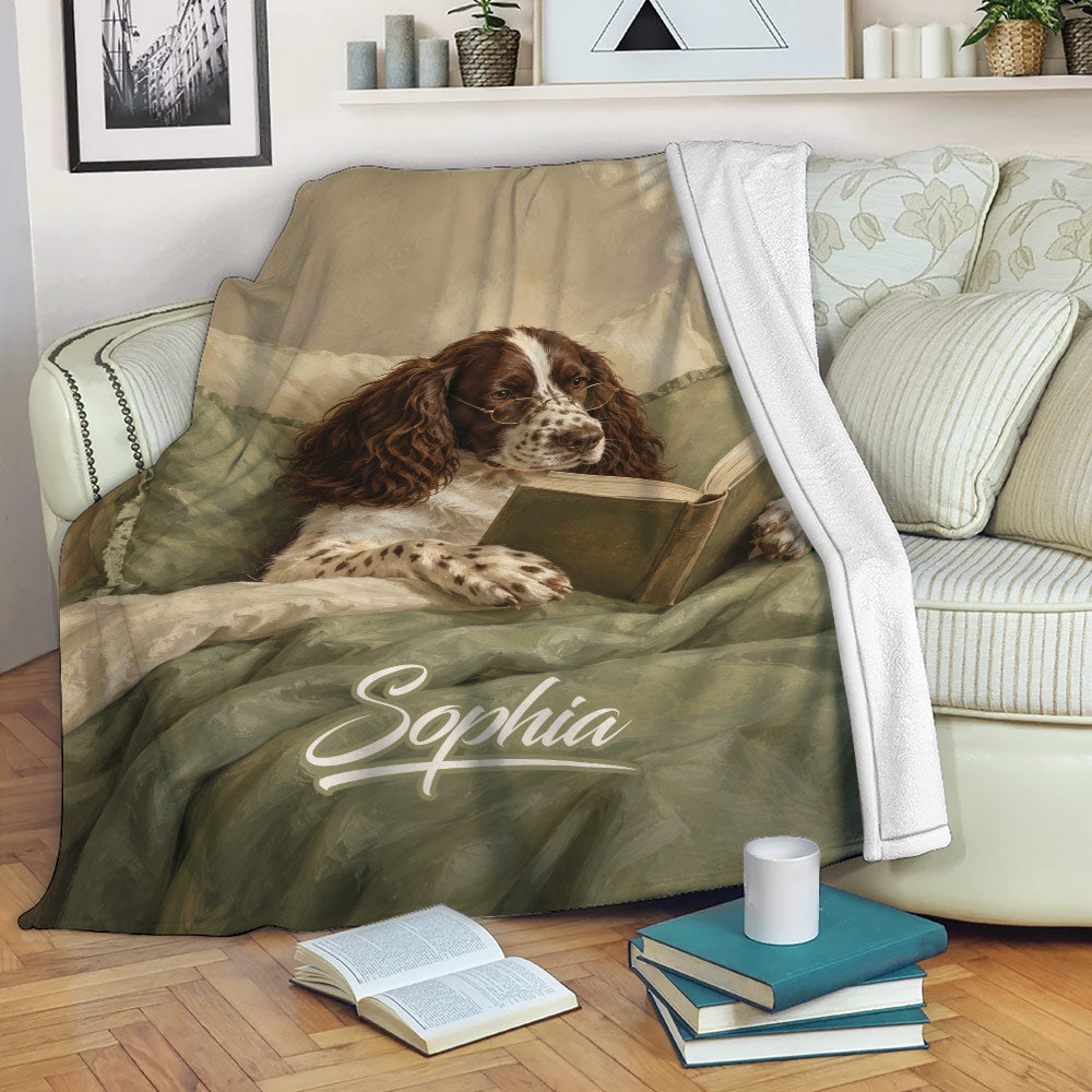 Custom English Springer Spaniel blanket draped over a sofa with a scholarly dog reading a book