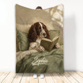 English Springer Spaniel reading a book on a cozy custom blanket in warm vintage-inspired colors