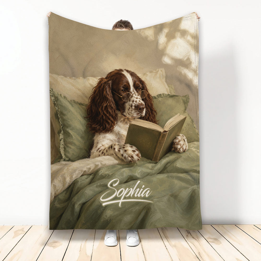 English Springer Spaniel reading a book on a cozy custom blanket in warm vintage-inspired colors