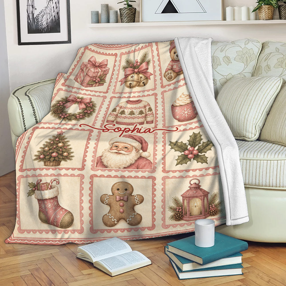 Vintage Christmas blanket draped over a sofa with Santa, wreaths, gifts, and cozy holiday illustrations