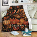 Thanksgiving turkey blanket draped over a sofa with pumpkins, autumn florals, and cozy seasonal colors