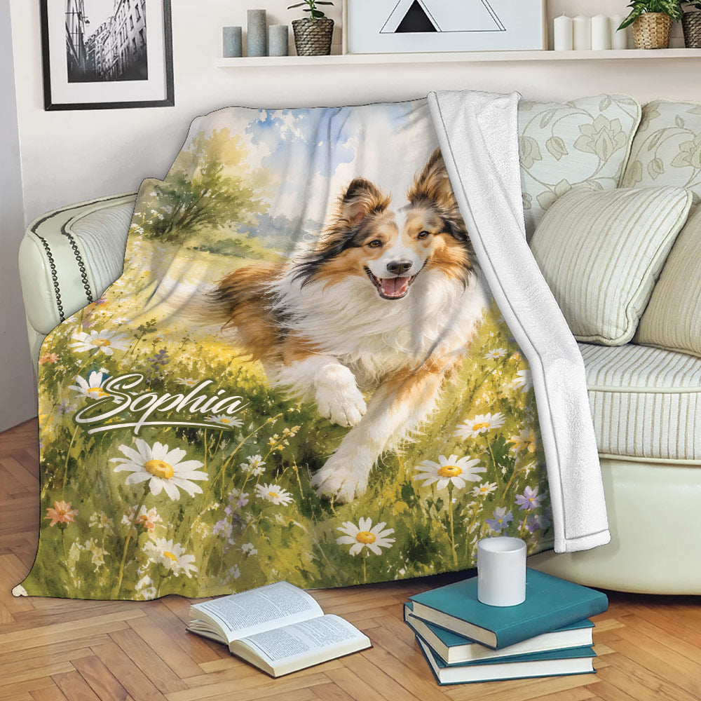 Sheltie blanket draped over a sofa with watercolor meadow artwork and floral details