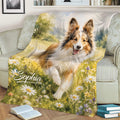 Close view of a Sheltie throw blanket featuring a joyful dog in a wildflower field