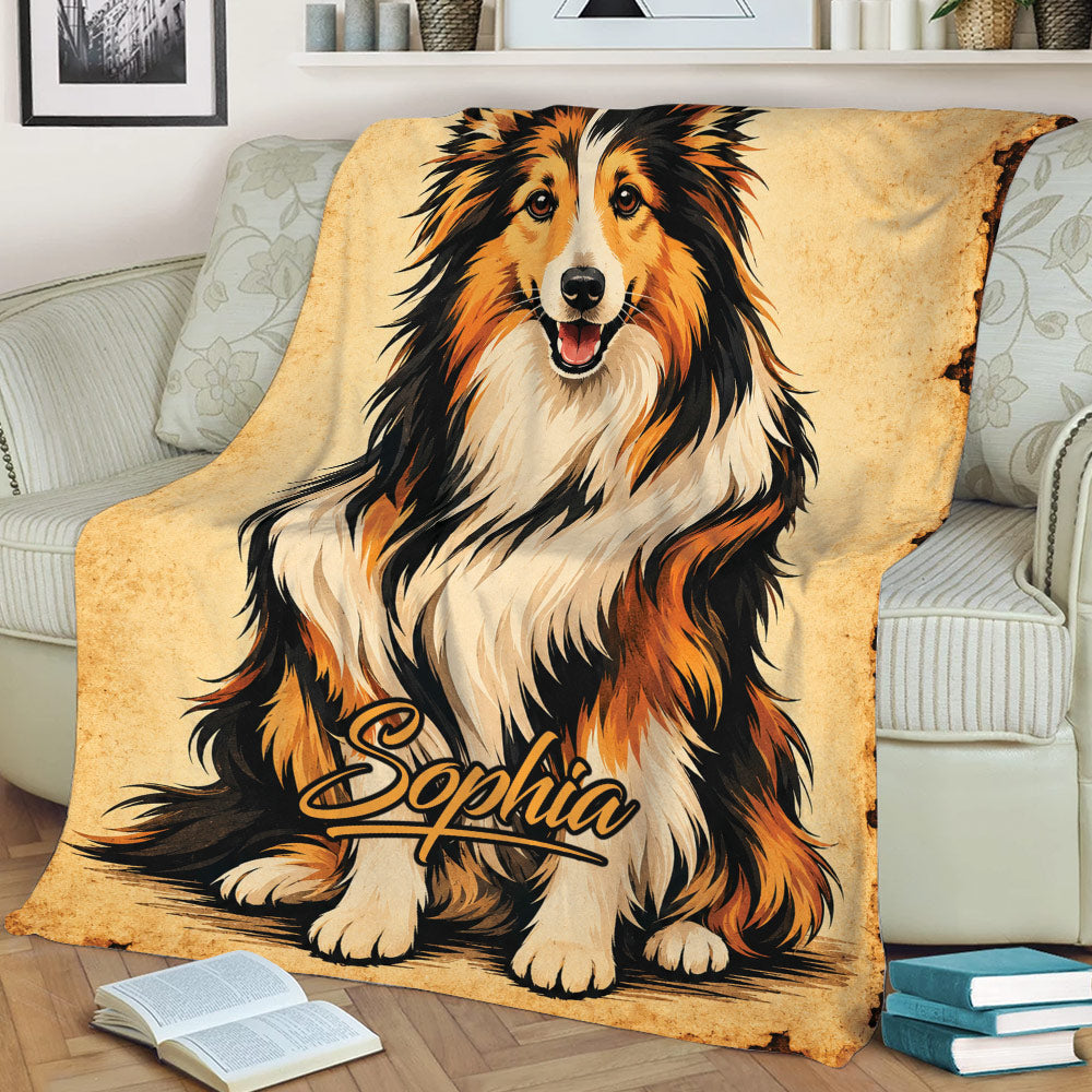 Close view of a custom Sheltie throw blanket draped over a sofa with detailed dog artwork