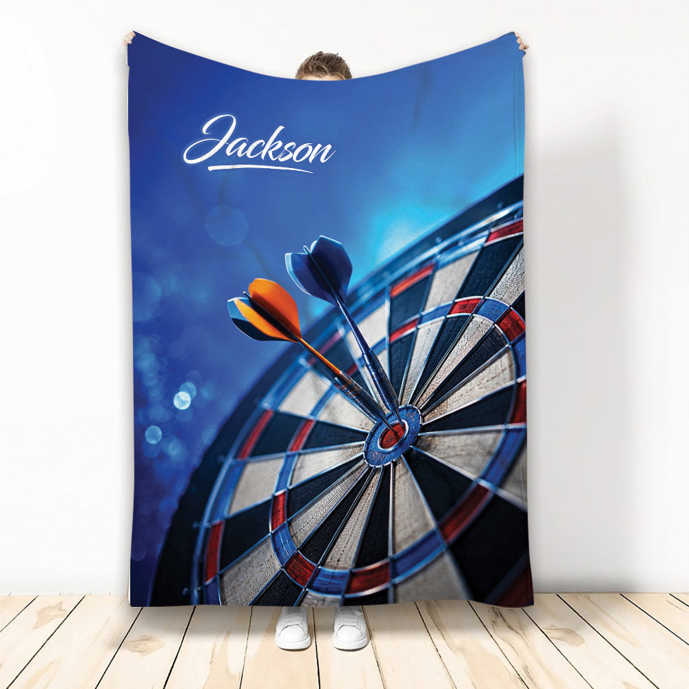 Dart board throw blanket displayed upright with colorful darts and blue sports artwork