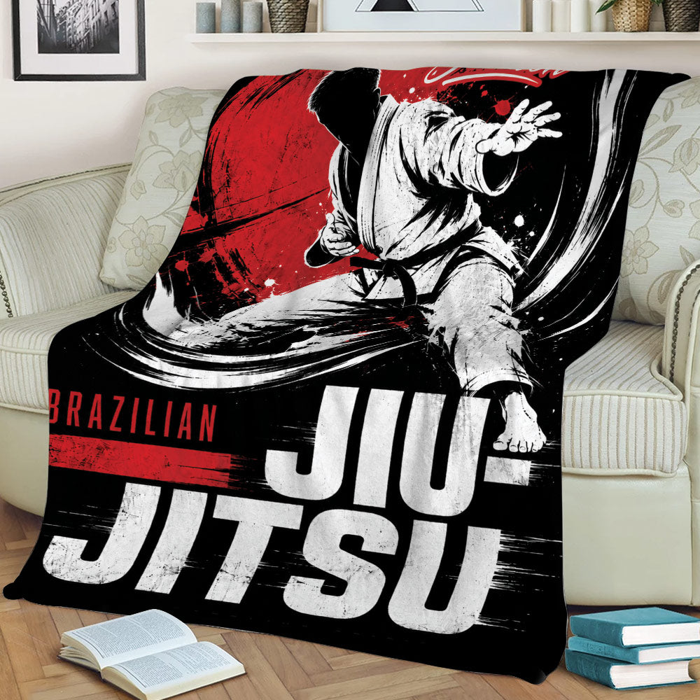 Brazilian Jiu Jitsu throw blanket displayed on a couch with dramatic grappler artwork