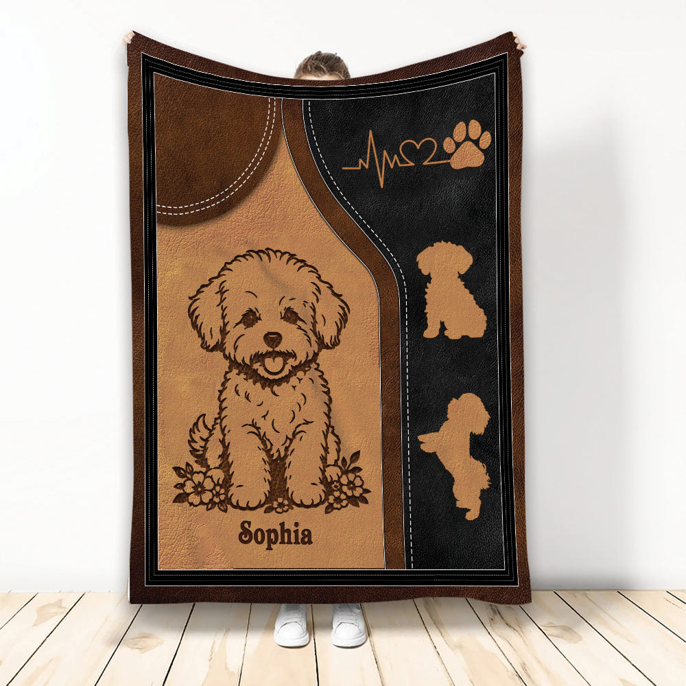Bichon Frise dog artwork on a brown and black blanket with paw print accents