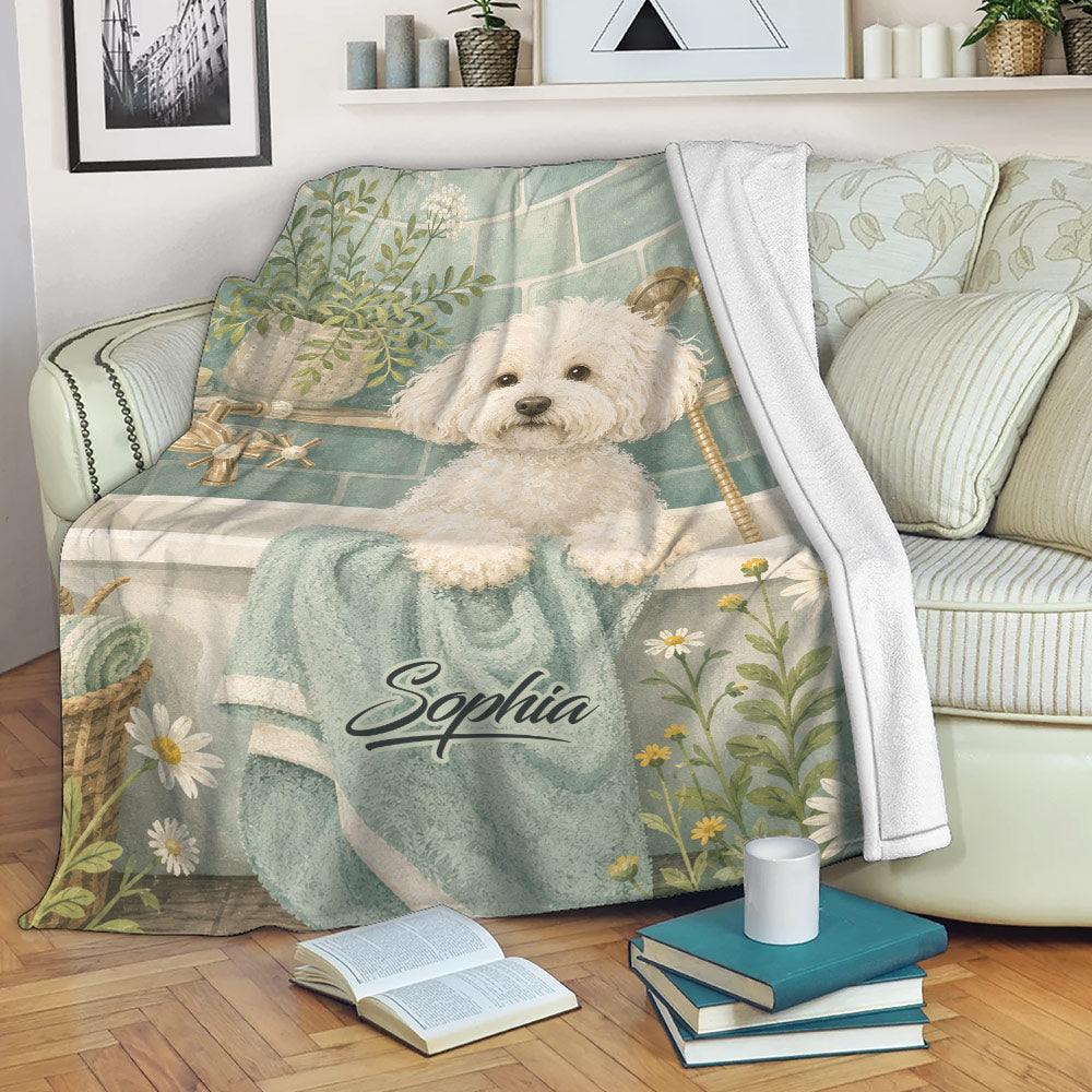 Bichon Frise throw blanket displayed on a sofa with a spa-themed dog design and floral accents