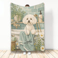 Bichon Frise blanket featuring a curly white dog in a botanical bathroom scene with teal and cream tones