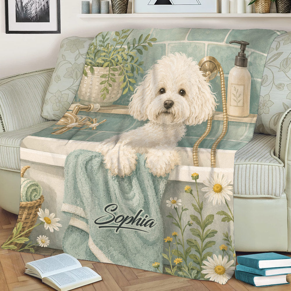 Bichon Frise blanket draped over a sofa, showing a white dog in a bathtub with greenery and daisies