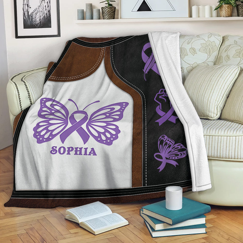 Fibromyalgia awareness throw blanket displayed on a sofa with purple butterfly artwork