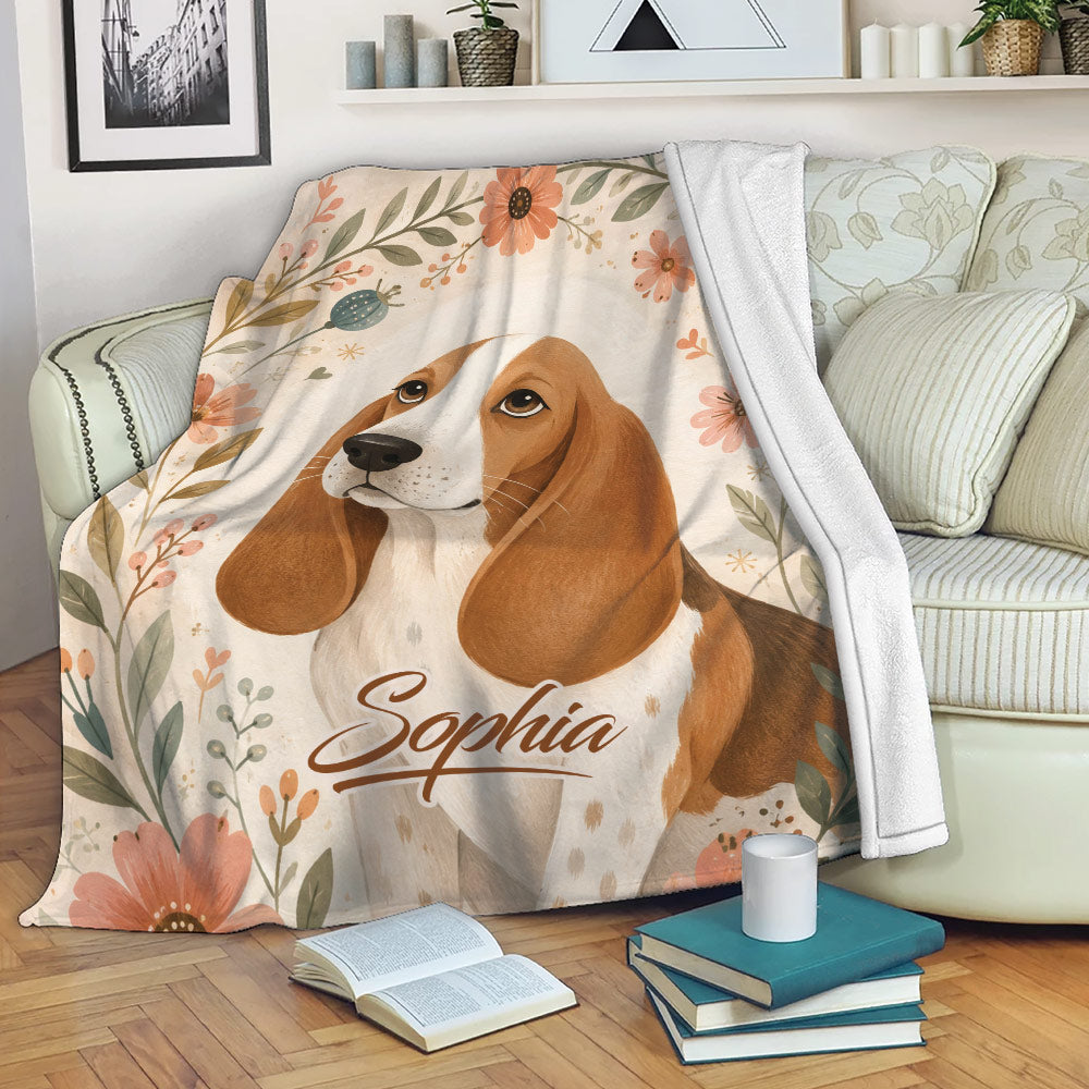 Basset Hound throw blanket draped over a sofa with watercolor flowers and cozy decor