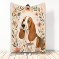Basset Hound blanket with warm brown dog artwork and a soft floral botanical border