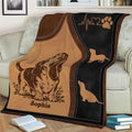 Close lifestyle view of a Basset Hound blanket draped over a sofa