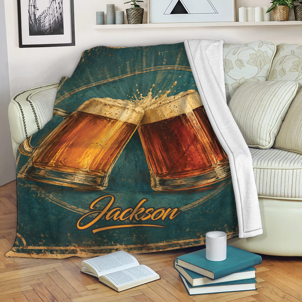 Beer throw blanket draped over a sofa with vintage clinking mugs and golden foam artwork