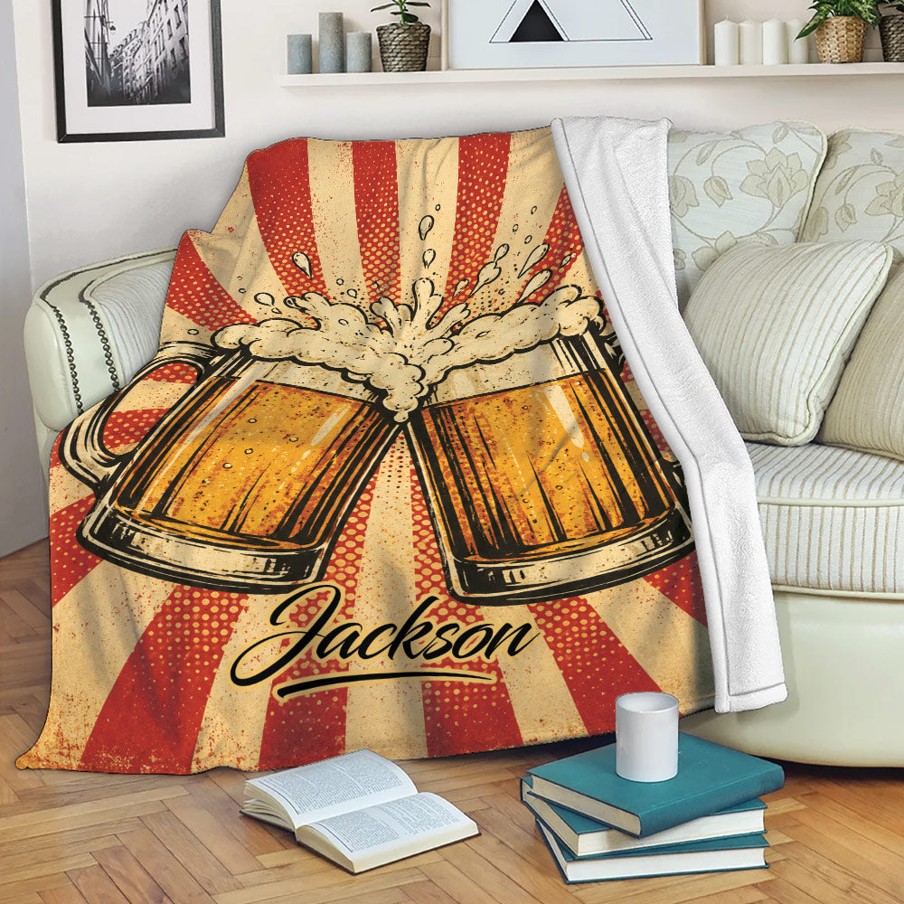 Beer throw blanket draped over a sofa with vintage-style mug artwork