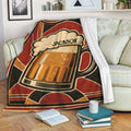 Beer pint throw blanket displayed across a sofa in a cozy living room
