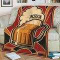 Retro beer mug blanket draped over a sofa with warm vintage colors