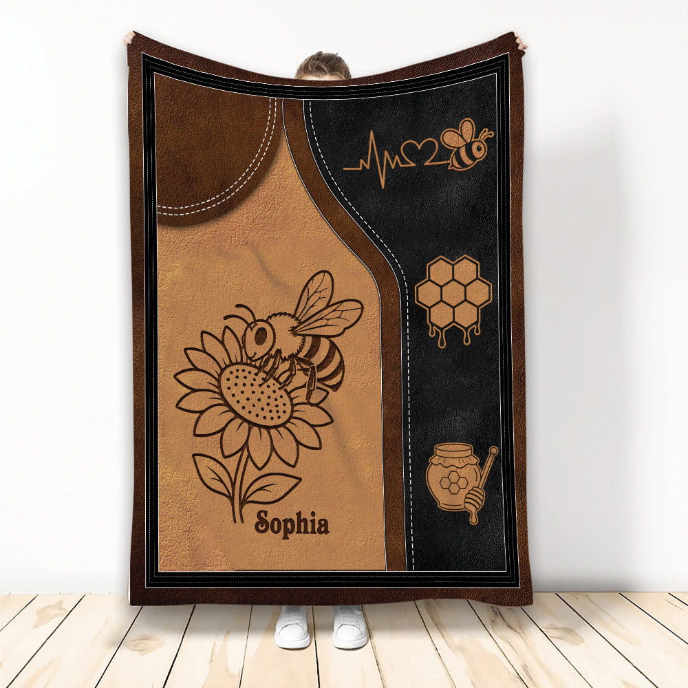 Bee throw blanket featuring a honeybee on a sunflower with honeycomb and honey jar artwork