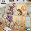 Bee blanket displayed on a sofa with lavender flowers and a vintage botanical illustration theme