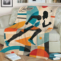 Runner-themed throw blanket draped over a sofa with bold geometric sports artwork